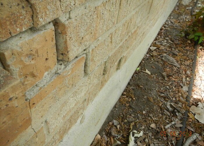 foundation damage causing step crack and brick movement in arlington